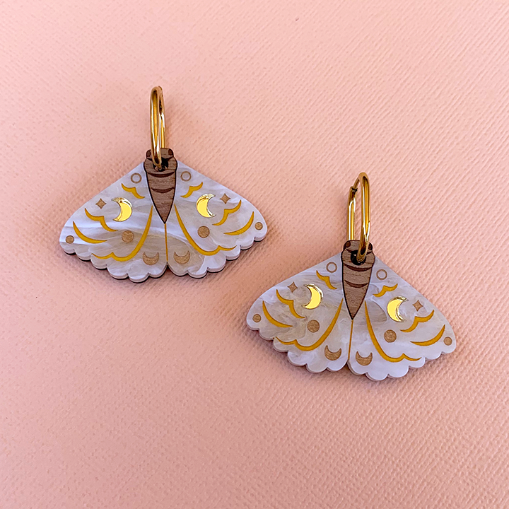 MOONSHINE MOTHS WHITE ACRYLIC HOOP EARRINGS