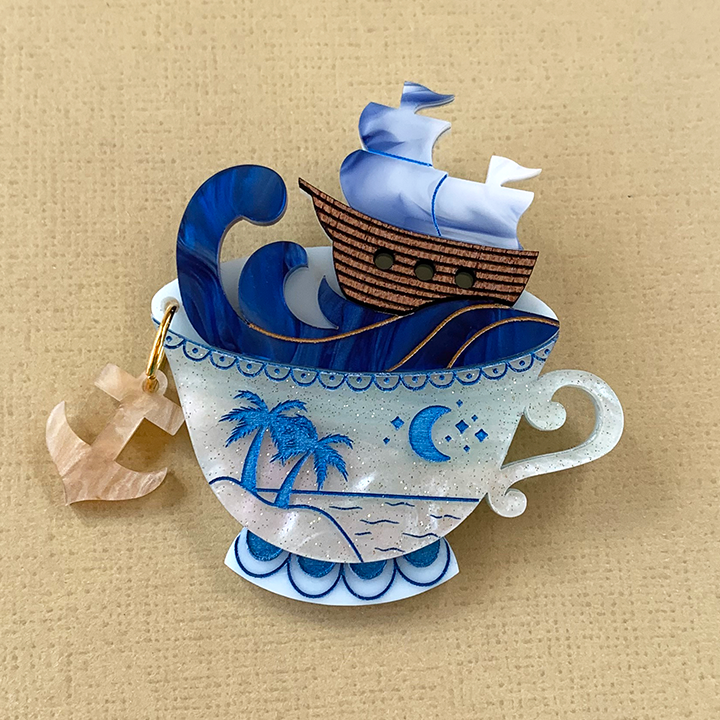 STORM IN A TEACUP BLUE MOON ACRYLIC BROOCH