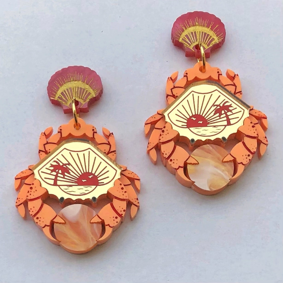 **SECONDS** RUBY SUN CRAB ACRYLIC EARRINGS