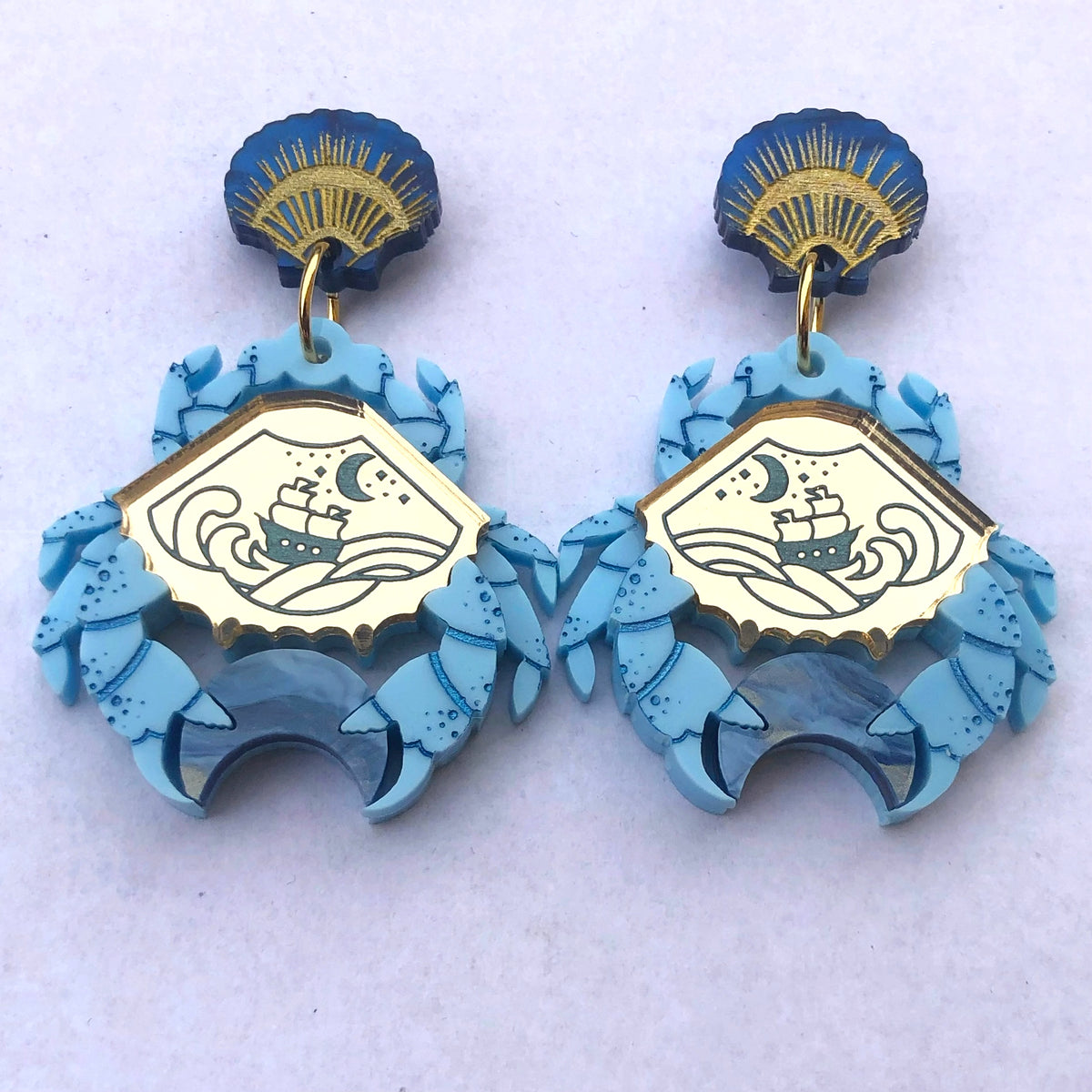 **SECONDS** MARNIE MOON CRAB EARRINGS